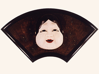 大きなおかめの面